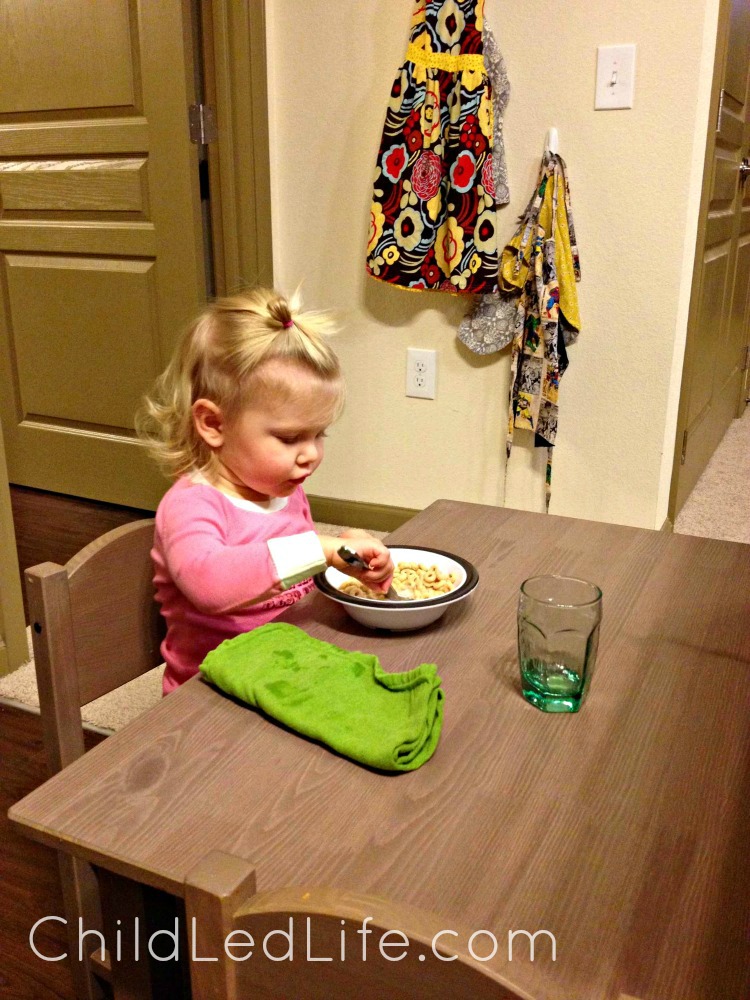 A child size table is a great way for kids to practice their Montessori kitchen still. Find more on Montessori tables and link up your favorite kids in the kitchen post on ChildLedLife.com