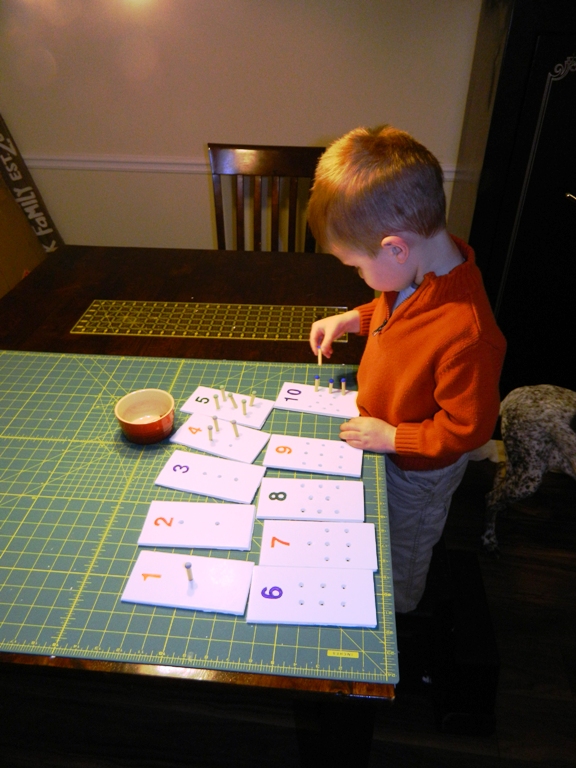 DIY early numbers math peg board game. So much cheaper then the Montessori specific game! On ChildLedLife.com